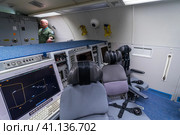 BERLIN, GERMANY - APRIL 25, 2018: Locations of operators of radio intelligence of Boeing E-3A Sentry AWACS. Exhibition ILA Berlin Air Show 2018. Редакционное фото, фотограф Sergey Kohl / Фотобанк Лори