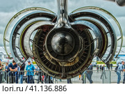 BERLIN, GERMANY - JUNE 03, 2016: Turbofan engine General Electric CF6-80C2 of medical aircraft Airbus A310-304 MRTT MedEvac "August Euler" (Luftwaffe). Close-up. HDRi, Tone Mapping. Exhibition ILA Berlin Air Show 2016. Редакционное фото, фотограф Sergey Kohl / Фотобанк Лори