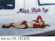 BERLIN, GERMANY - JUNE 03, 2016: Figure in style Pin-up girl on board a maritime patrol and search-and-rescue seaplane Consolidated PBY Catalina (PBY-5A). Exhibition ILA Berlin Air Show 2016. Редакционное фото, фотограф Sergey Kohl / Фотобанк Лори