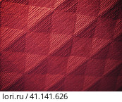 Geometric abstract background from triangles, squares and lines. Three-dimensional bulge. The volume and flex of the diagonally positioned foam material. Red, burgundy and pink shades. Стоковое фото, фотограф Юлия Петровская / Фотобанк Лори