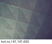 Geometric abstract background from triangles, squares and lines. Three-dimensional bulge. The volume and flex of the diagonally positioned foam material. Blue, gray and pink shades. Стоковое фото, фотограф Юлия Петровская / Фотобанк Лори