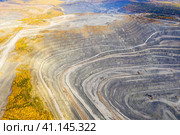 Opencast mining of iron ore. Environmental pollution problems. Стоковое фото, фотограф Евгений Ткачёв / Фотобанк Лори