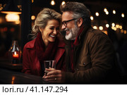 Happy and loving middle aged couple on a romantic date in a cafe in winter. Стоковое AI-изображение, AI-художник Светлана Лажко / Фотобанк Лори