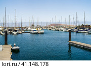 PLAYA BLANCA, LANZAROTE - JULY 18, 2022: Marina Rubicon of Playa Blanca. Playa Blanca is the southernmost town of the Spanish island of Lanzarote. It is the newest resort on the island. Редакционное фото, фотограф Sergey Kohl / Фотобанк Лори