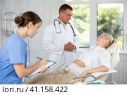 Sick female patient having aches and visiting doctor. Стоковое фото, фотограф Яков Филимонов / Фотобанк Лори