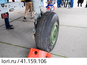 Chassis of a military aircraft. Su-35 fighter at the air show. Aircraft on the airfield to show the audience. (2017 год). Редакционное фото, фотограф Леонид Еремейчук / Фотобанк Лори