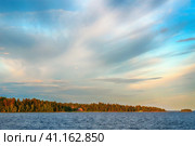 View of Konevets Island, Konevsky Skete at sunset from Lake Ladoga. (2023 год). Стоковое фото, фотограф Оксана Медведева / Фотобанк Лори