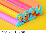 3D illustration inscription 2024 on a colorful  background. Changeability of years. Illustration of the symbol of the new year. Стоковое фото, фотограф Виталий Сова / Фотобанк Лори