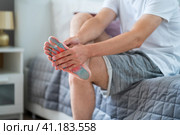 Joint diseases, hallux valgus, plantar fasciitis, man's leg hurts, pain in the foot. Стоковое фото, фотограф Станислав Тарко / Фотобанк Лори