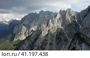 Aerial fly along Dachstein summit mountains near Hinterer Gosausee lake Upper Austria. Стоковое фото, фотограф Igor Tichonow / Фотобанк Лори
