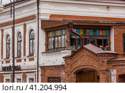 Kayuma Nasyri Street. Staro-Tatarskaya Sloboda. Summer day. Russia, September 2023. The Republic of Tatarstan. Kazan. Редакционное фото, фотограф Photojuli / Фотобанк Лори