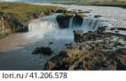 Iceland landscape drone 4k view of Godafoss waterfall. Most famous tourist attractions. Стоковое видео, видеограф Igor Tichonow / Фотобанк Лори