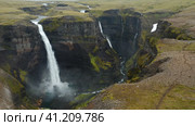 Haifoss waterfall in Iceland, Aerial view. Natural wonder Landmannalaugar canyon. Стоковое фото, фотограф Igor Tichonow / Фотобанк Лори
