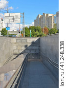 Moscow, Russia - July 30. 2023. Descent into modern pedestrian underpass in Zelenograd on Gogol street. Редакционное фото, фотограф Володина Ольга / Фотобанк Лори