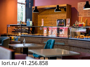 The interior of a stylish, modern cafe, bakery Croissant Dore in Nizhny Novgorod. Russia, Nizhny Novgorod, August 2023. Редакционное фото, фотограф Photojuli / Фотобанк Лори