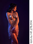 Sensual woman dazzled with crystals and silver all over her body. Стоковое фото, фотограф Гурьянов Андрей / Фотобанк Лори