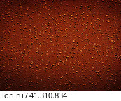 The background is red or scarlet. A beautiful festive heterogeneous textured background with specks, dots, veins, fibers, relief and other textures. Gradient change in color and awareness. Copy space. Стоковое AI-изображение, AI-художник Юлия Петровская / Фотобанк Лори