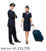 Captain of the aircraft and a beautiful flight attendant in a dark blue uniform. Стоковое фото, фотограф Андрей Аркуша / Фотобанк Лори