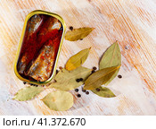 Open tin can of spicy sardines in aluminium can. Стоковое фото, фотограф Яков Филимонов / Фотобанк Лори