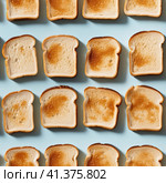Croutons of white bread on a homogeneous background. Generated by AI. Стоковое AI-изображение, AI-художник Ярославский Максим / Фотобанк Лори