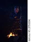 Russia, St. Petersburg 28,12,2016 Blacksmith in a medieval forge at the medieval festival "Days of History" (2015 год). Редакционное фото, фотограф Анна Кривицкая / Фотобанк Лори