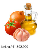 Bottle of olive oil, garlic, tomato and onion isolated on white background. Стоковое фото, фотограф Катерина Ковалева / Фотобанк Лори