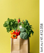A variety of fresh vegetables in an eco-friendly wicker basket. Generated by AI. Стоковое AI-изображение, AI-художник Ярославский Максим / Фотобанк Лори