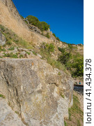 The remains of a medieval fortress city (according to other sources - a monastery) Tepe-Kermen, covering the upper part of the mountain in several tiers (2020 год). Стоковое фото, фотограф Анна Кривицкая / Фотобанк Лори