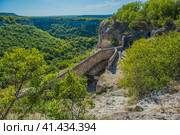The remains of a medieval fortress city (according to other sources - a monastery) Tepe-Kermen, covering the upper part of the mountain in several tiers (2020 год). Стоковое фото, фотограф Анна Кривицкая / Фотобанк Лори