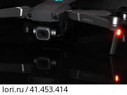 Drone. DJI Mavik 2 missile defense. Unmanned aerial vehicle with photo-video camera. Grey professional, quadcopter. Стоковое фото, фотограф Egor Sarantstv / Фотобанк Лори
