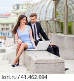Attractive business young couple working together. Стоковое фото, фотограф Андрей Аркуша / Фотобанк Лори