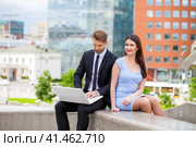 Attractive business young couple working together. Стоковое фото, фотограф Андрей Аркуша / Фотобанк Лори