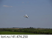 The spraying of fertilizers and pesticides on the field with the aircraft. Стоковое фото, фотограф Леонид Еремейчук / Фотобанк Лори