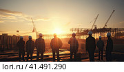Engineers are standing in front of a building under construction. Generated by AI. Стоковое AI-изображение, AI-художник Ярославский Максим / Фотобанк Лори