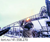 welding steel parts accessories. Installation installations Heater-Treater. Стоковое фото, фотограф Леонид Еремейчук / Фотобанк Лори