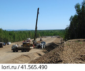 Construction of gas pipeline on the ground. Стоковое фото, фотограф Леонид Еремейчук / Фотобанк Лори