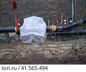 Laying of the gas pipeline in a ditch. Installation works. Стоковое фото, фотограф Леонид Еремейчук / Фотобанк Лори