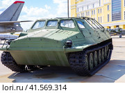 All-terrain vehicle on track, caterpillar truk, tracked transport snow swamp vehicle. Стоковое фото, фотограф Евгений Ткачёв / Фотобанк Лори