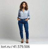 A young smiling confident pretty attractive European girl of 20 years old in a gray casual T-shirt, looking away, isolated on a white background Created by AI. Стоковое AI-изображение, AI-художник Ярославский Максим / Фотобанк Лори