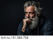 Portrait of an elderly man with a large gray beard and lush hair on his head with a thoughtful look. Dark background.Generated by AI. Стоковое AI-изображение, AI-художник Ярославский Максим / Фотобанк Лори