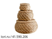 Close-up of three round stream box with lid. Wicker caskets for storage, isolated on a white background. Стоковое фото, фотограф Андрей Журавлев / Фотобанк Лори