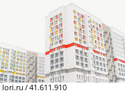 Многоэтажный дом. Новостройка. Multi-storey building. New building. (2022 год). Стоковое фото, фотограф Ольга Митряева / Фотобанк Лори