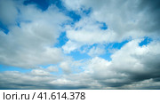 The overcast weather couldn't dampen the beauty of the cloudscape, as white clouds continued to roll in against the grey backdrop. Стоковое фото, фотограф Андрей Журавлев / Фотобанк Лори