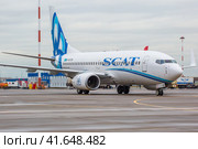 Пассажирский лайнер Boeing 737-700 авиакомпании "SCAT" (2023 год). Редакционное фото, фотограф Александр Тарасенков / Фотобанк Лори