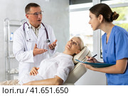 Sick female patient having aches and visiting doctor. Стоковое фото, фотограф Яков Филимонов / Фотобанк Лори