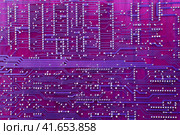 Pink printed circuit board background. Texture mechanically supports and electrically connects electrical or electronic components using conductive tracers. Стоковое фото, фотограф Андрей Журавлев / Фотобанк Лори