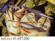 Vintage blacksmith tools. Hand-made antique tool for blacksmithing. Стоковое фото, фотограф Андрей Журавлев / Фотобанк Лори