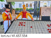 Moscow \ Russia 06 07 2019: Yellow with red military uniform of Napoleon army. International Times and Epochs history reenactment street festival. Officer, 1813 year battle of Dresden - reconstruction. Редакционное фото, фотограф Андрей Журавлев / Фотобанк Лори
