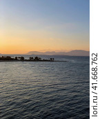 Beautiful sunset at the seaside, Greece. Редакционное фото, фотограф Екатерина Каляева / Фотобанк Лори