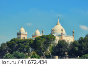 Saint Louis Cathedral is a Catholic Church in Tunisia on Byrsa hill among the ruins of ancient Carthage (2019 год). Стоковое фото, фотограф Андрей Журавлев / Фотобанк Лори
